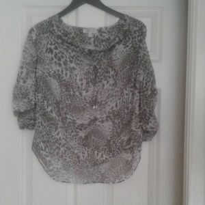 Jennifer Lopez animal print blouse